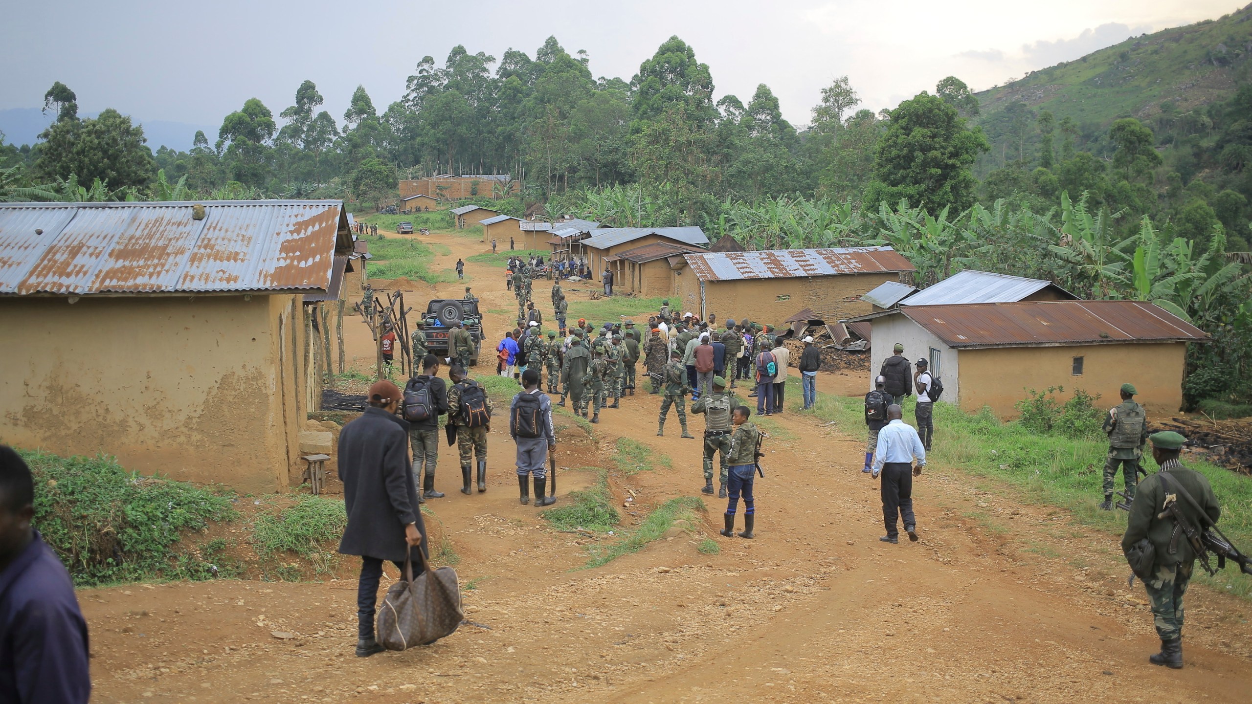 FILE - Democratic Republic of Congo Defence Forces gather in the North Kivu province village of Mukondi, on March 9, 2023. (AP Photo/Socrate Mumbere, File)