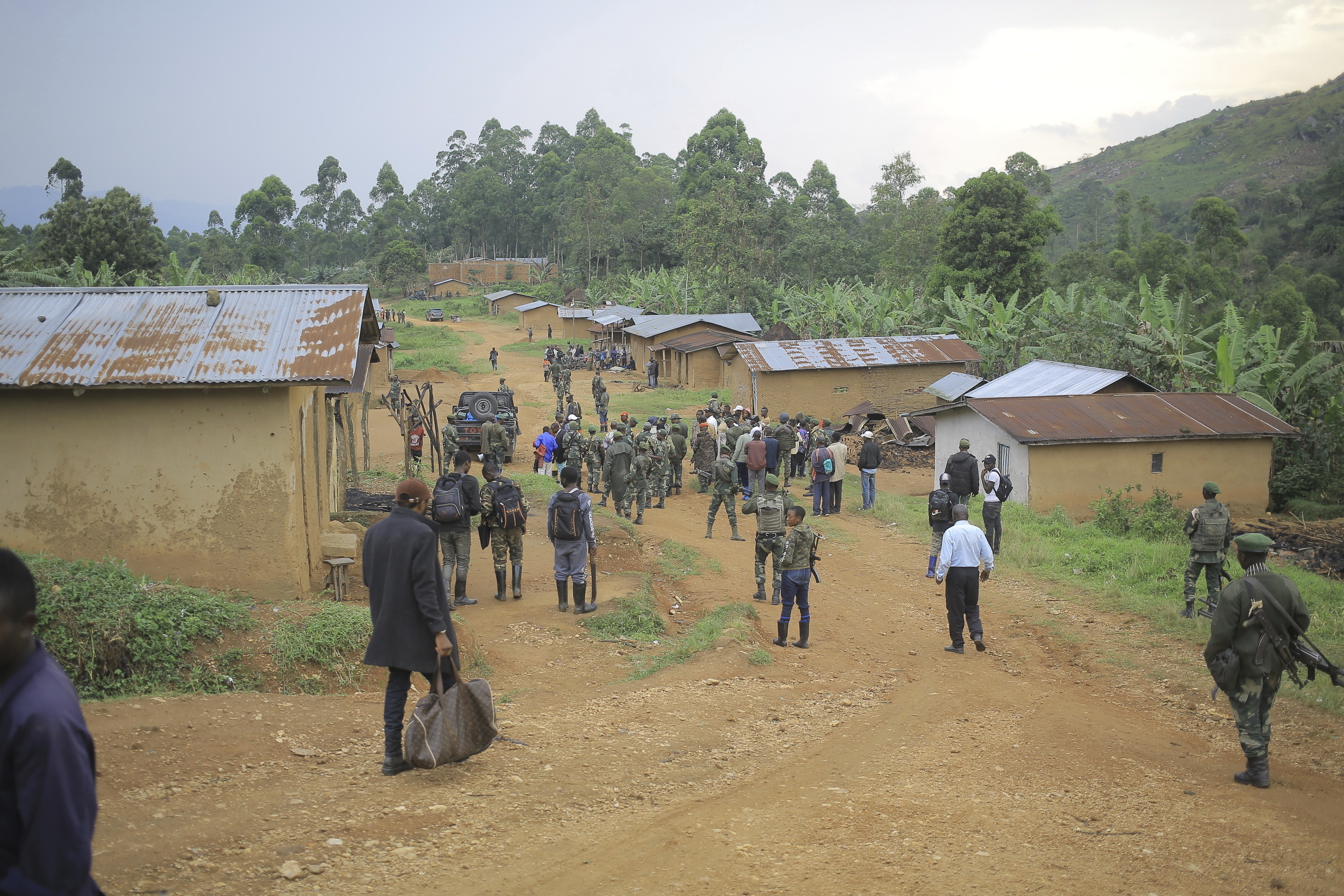 FILE - Democratic Republic of Congo Defence Forces gather in the North Kivu province village of Mukondi, on March 9, 2023. (AP Photo/Socrate Mumbere, File)