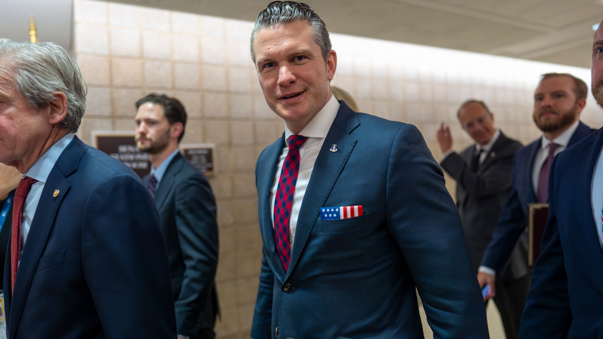 Pete Hegseth, President-elect Donald Trump's nominee to be Defense Secretary, walks to meet with senators, at the Capitol in Washington, Tuesday, Dec. 17, 2024. (AP Photo/J. Scott Applewhite)