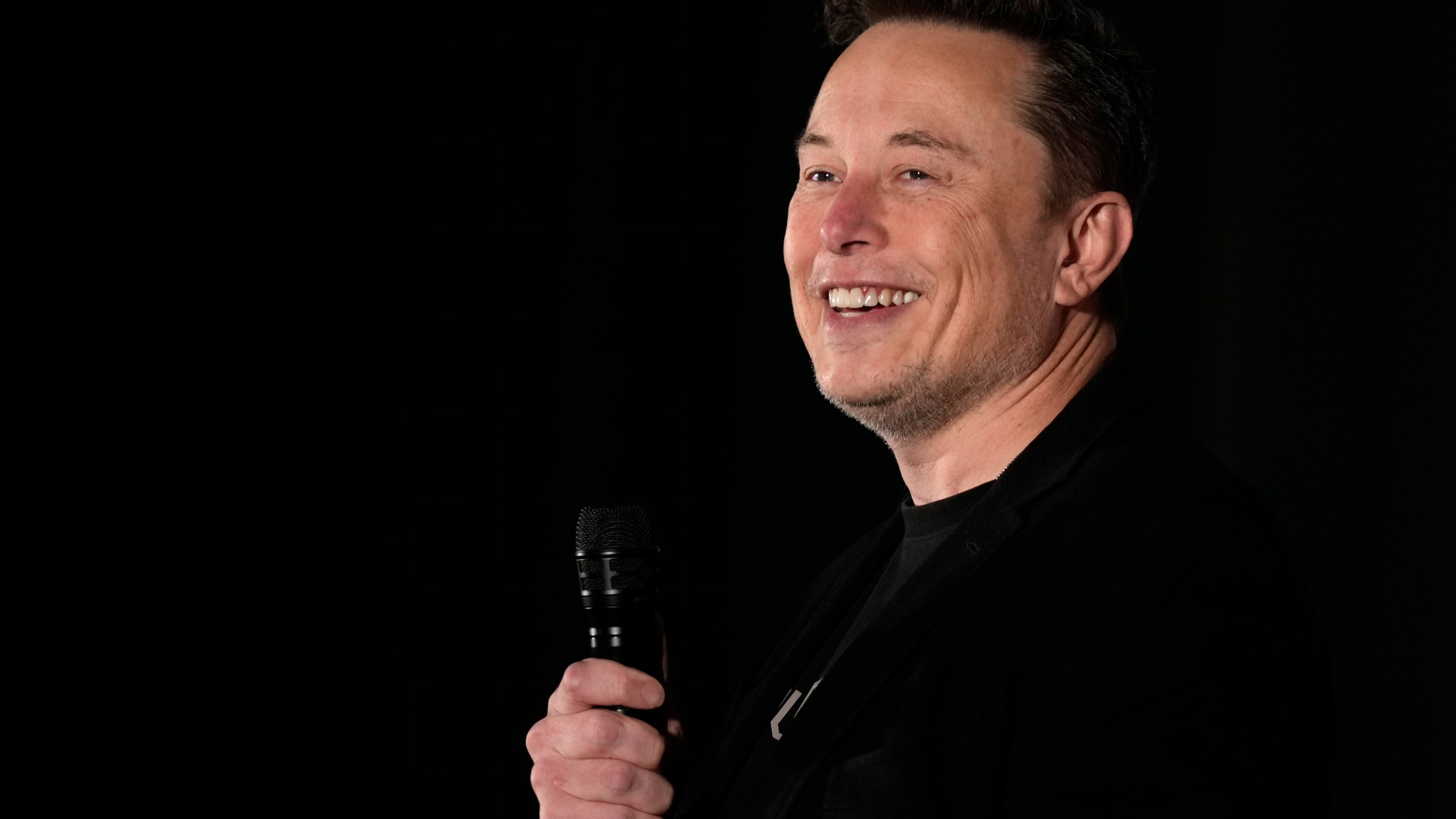 FILE - Elon Musk speaks as part of a campaign town hall in support of Republican presidential nominee former President Donald Trump in Folsom, Pa., Thursday, Oct. 17, 2024. (AP Photo/Matt Rourke, File)