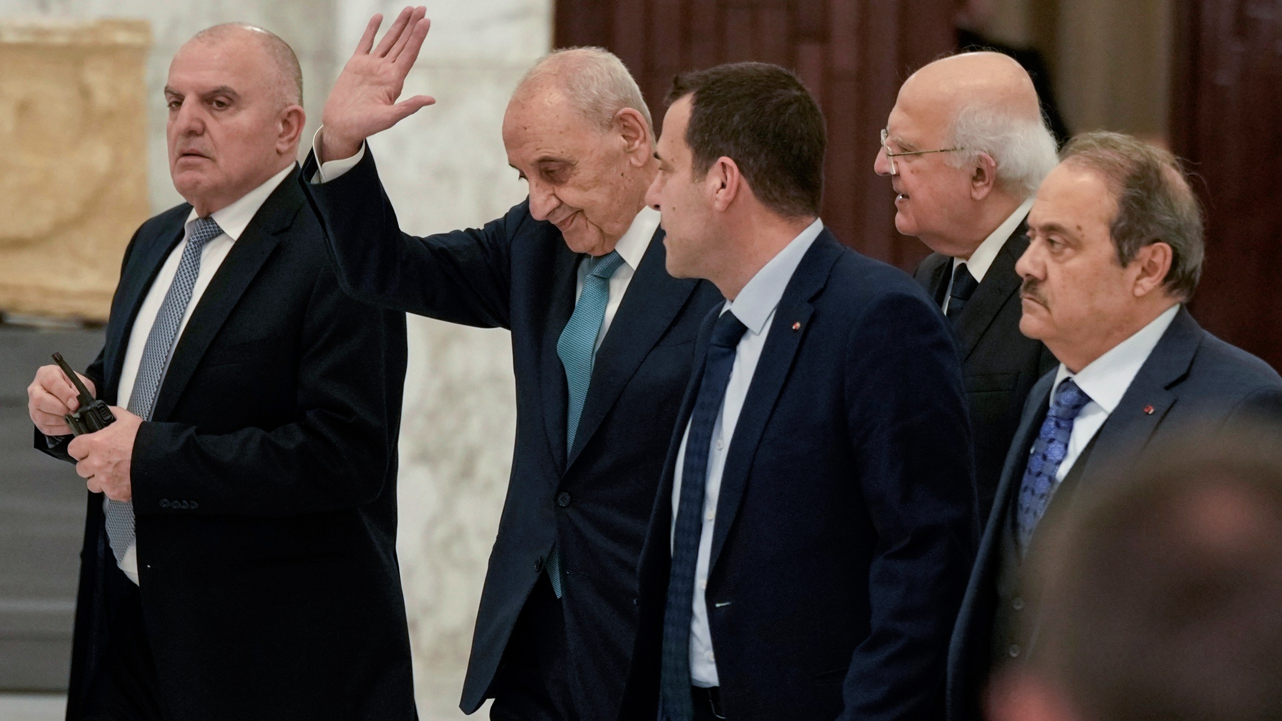 Parliament Speaker Nabih Berri, second left, waves to journalists after his meeting with Lebanese President Joseph Aoun at the presidential palace in Baabda, east of Beirut, Lebanon, Monday, Jan. 13, 2025. (AP Photo/Bilal Hussein)