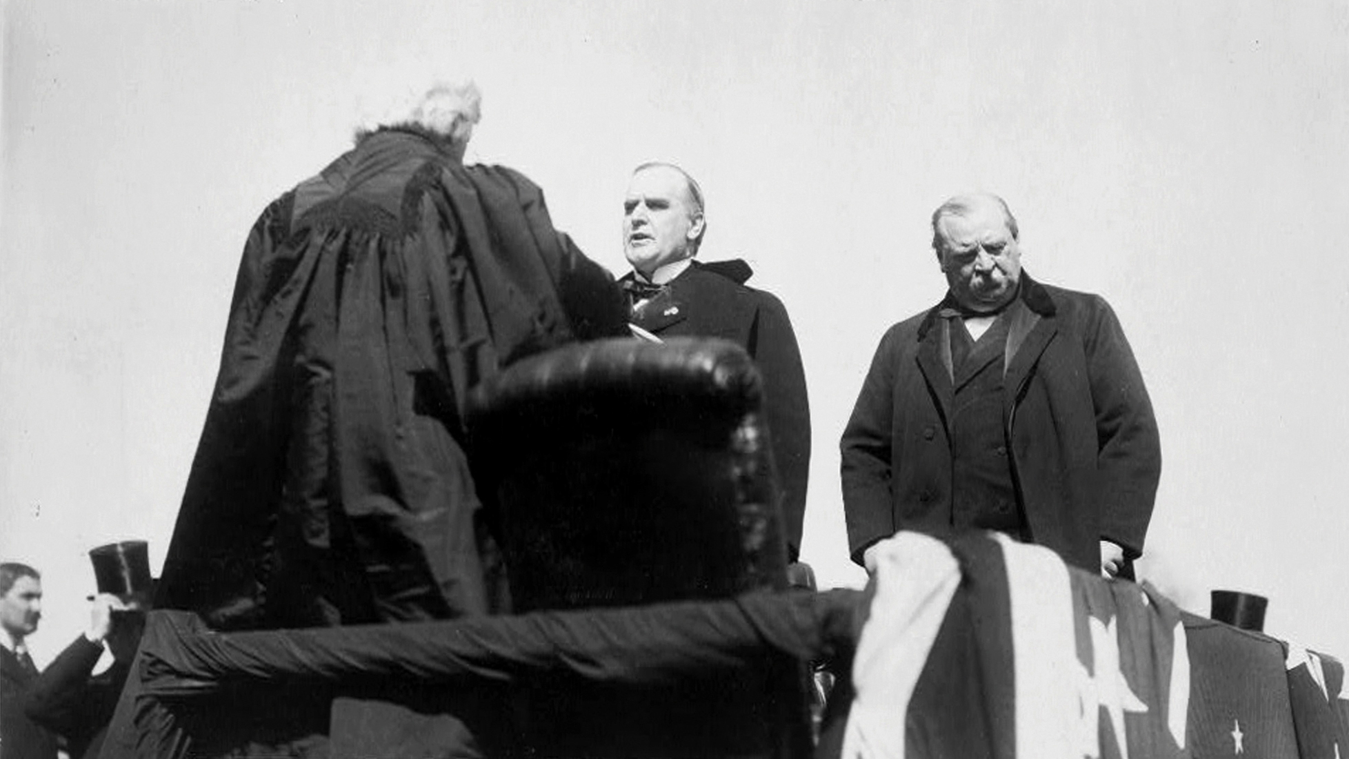 FILE - Chief Justice Melville Weston Fuller administers the oath of office to President-elect William McKinley during his inauguration in Washington, March 4, 1897, as outgoing President Grover Cleveland stands behind McKinley. (Library of Congress via AP File)