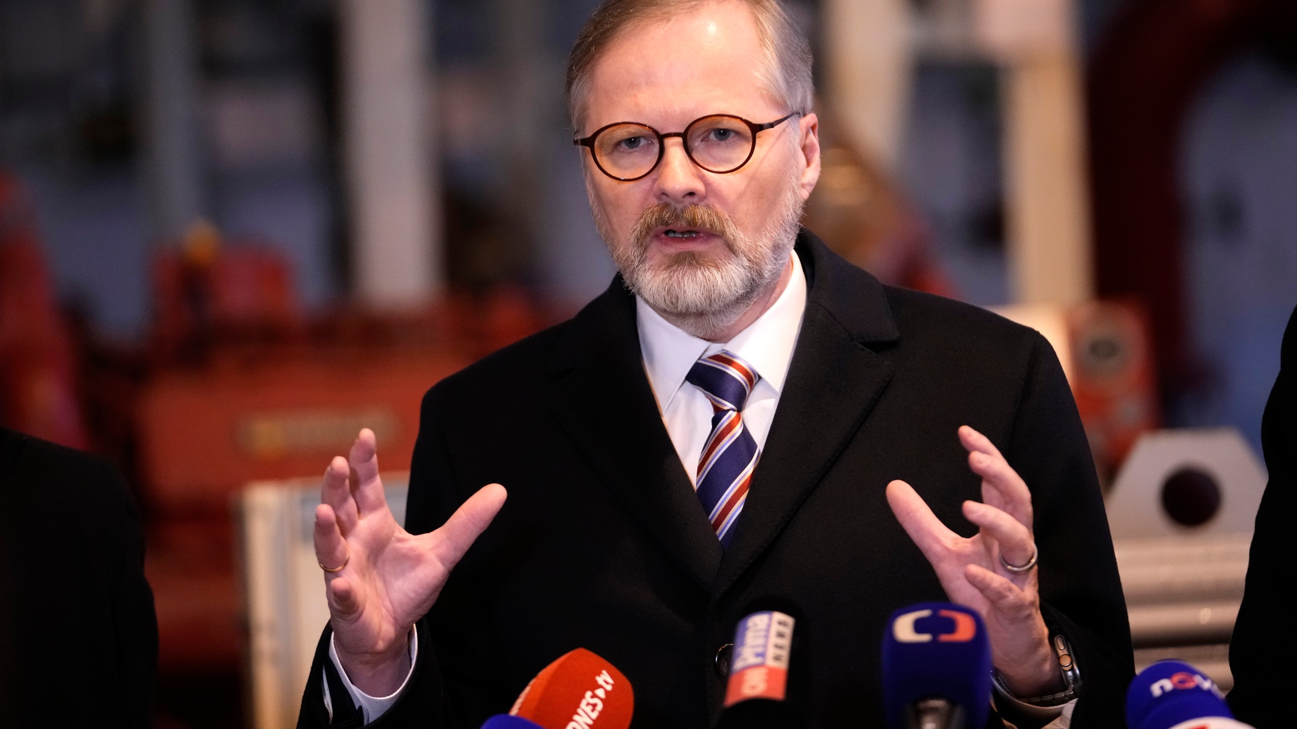 Czech Republic's Prime Minister Petr Fialla addresses media at the Central Oil Tank Farm near Nelahozeves, Czech Republic, Tuesday, Jan. 14, 2025. (AP Photo/Petr David Josek)