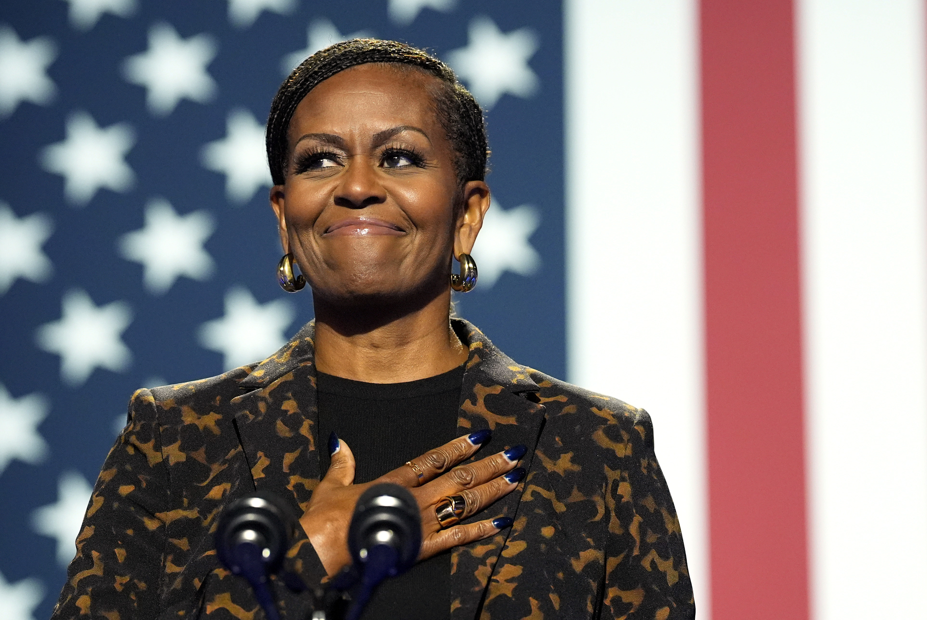 FILE - Former first lady Michelle Obama speaks at a campaign rally for democratic presidential nominee Vice President Kamala Harris at the Wings Event Center, in Kalamazoo, Mich., Oct. 26, 2024. (AP Photo/Jacquelyn Martin, File)