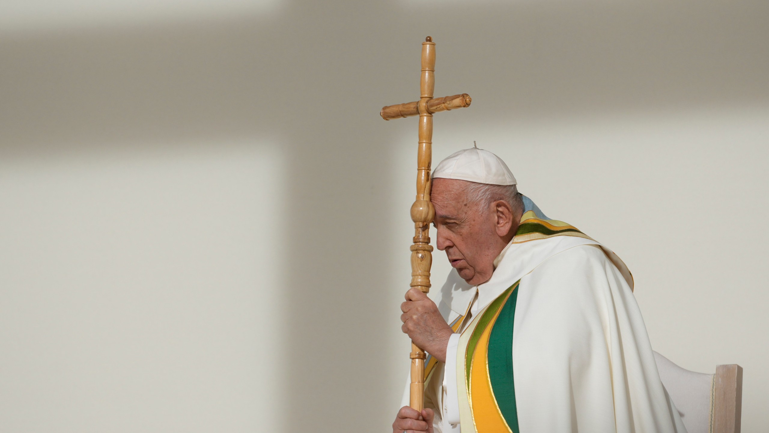 FILE - Pope Francis holds the pastoral staff as he presides over the Sunday mass at King Baudouin Stadium, in Brussels Sunday, Sept. 29, 2024. (AP Photo/Andrew Medichini)