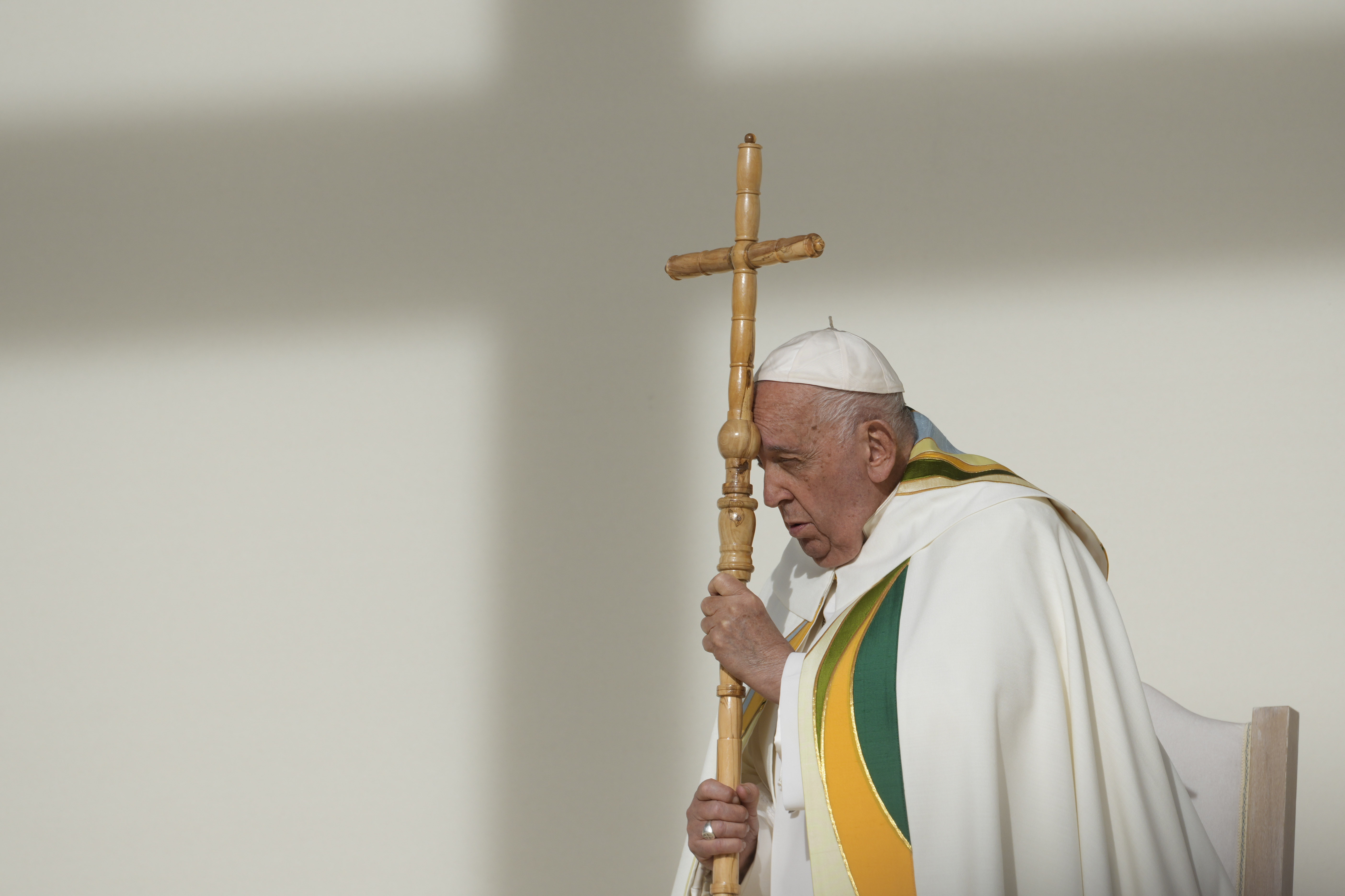 FILE - Pope Francis holds the pastoral staff as he presides over the Sunday mass at King Baudouin Stadium, in Brussels Sunday, Sept. 29, 2024. (AP Photo/Andrew Medichini)