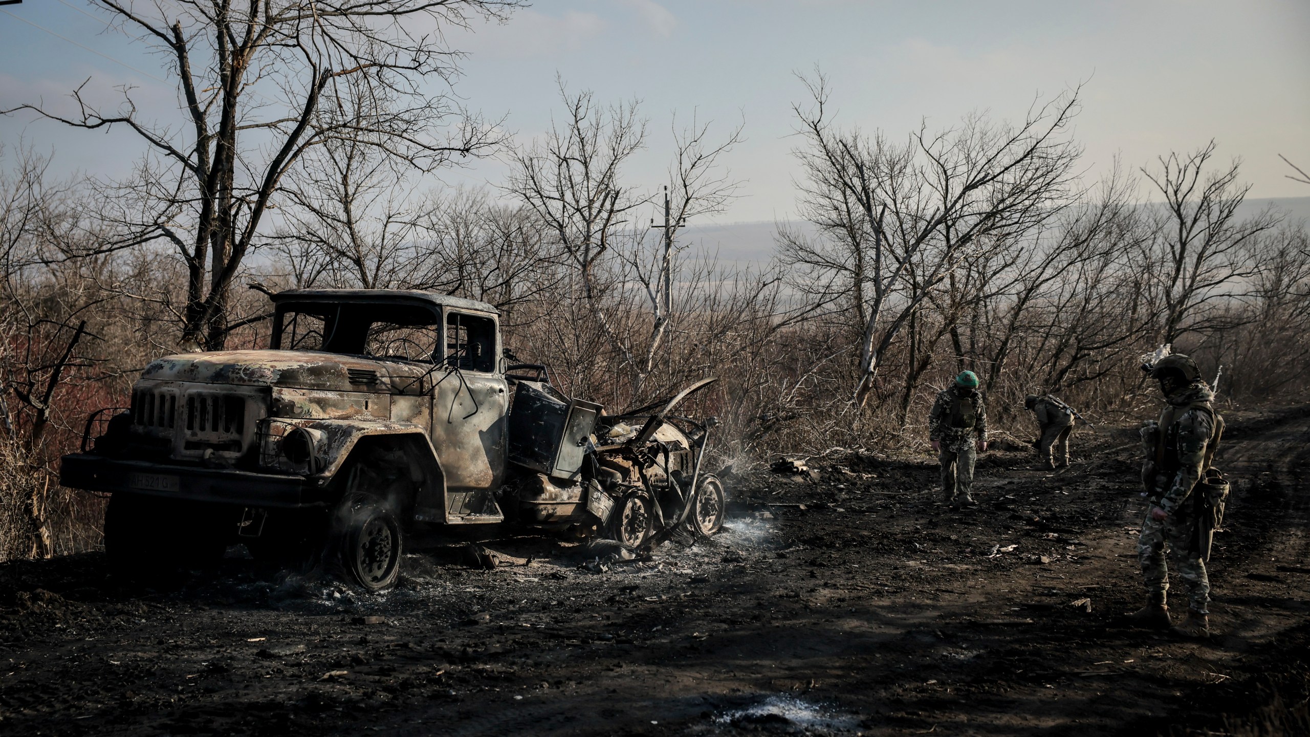 FILE - Ukrainian servicemen collect damaged ammunition on the road at the front line near Chasiv Yar town, in Donetsk region, Ukraine, on Jan. 10, 2025. (Oleg Petrasiuk/Ukraine's 24th Mechanised Brigade via AP, File)