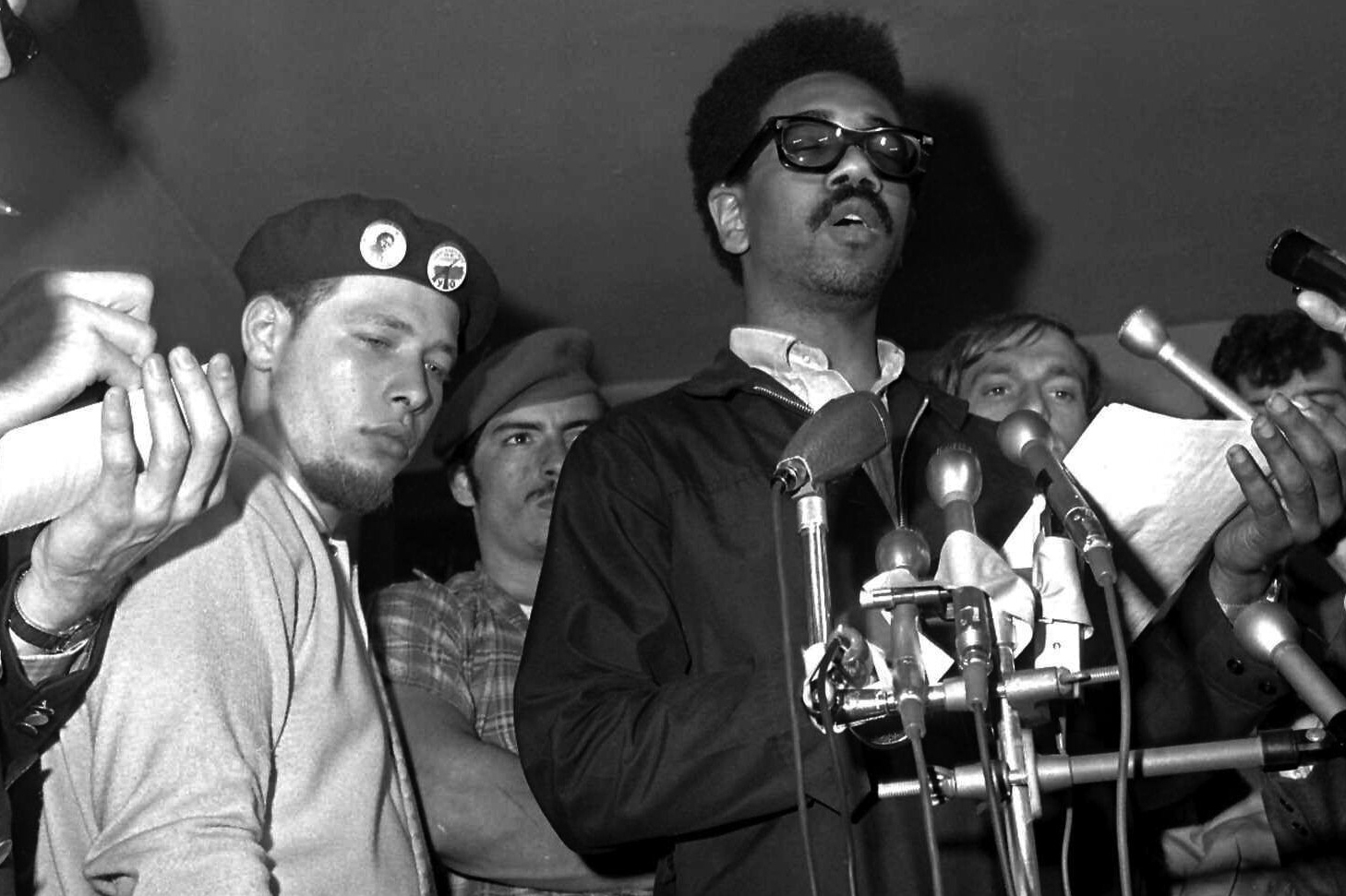 FILE - Puerto Rican Jose “Cha Cha” Jimenez, left, founder of the Young Lords in Chicago-area Puerto Rican group, attends a news conference led by Bobby Rush, deputy defense minister of the Illinois Black Panther party, in Chicago, June 4, 1969. Jiménez, a prominent civil rights and liberation movement figure died at the age of 76 his sister announced Friday, Jan. 10, 2025. (AP Photo/EK, File)