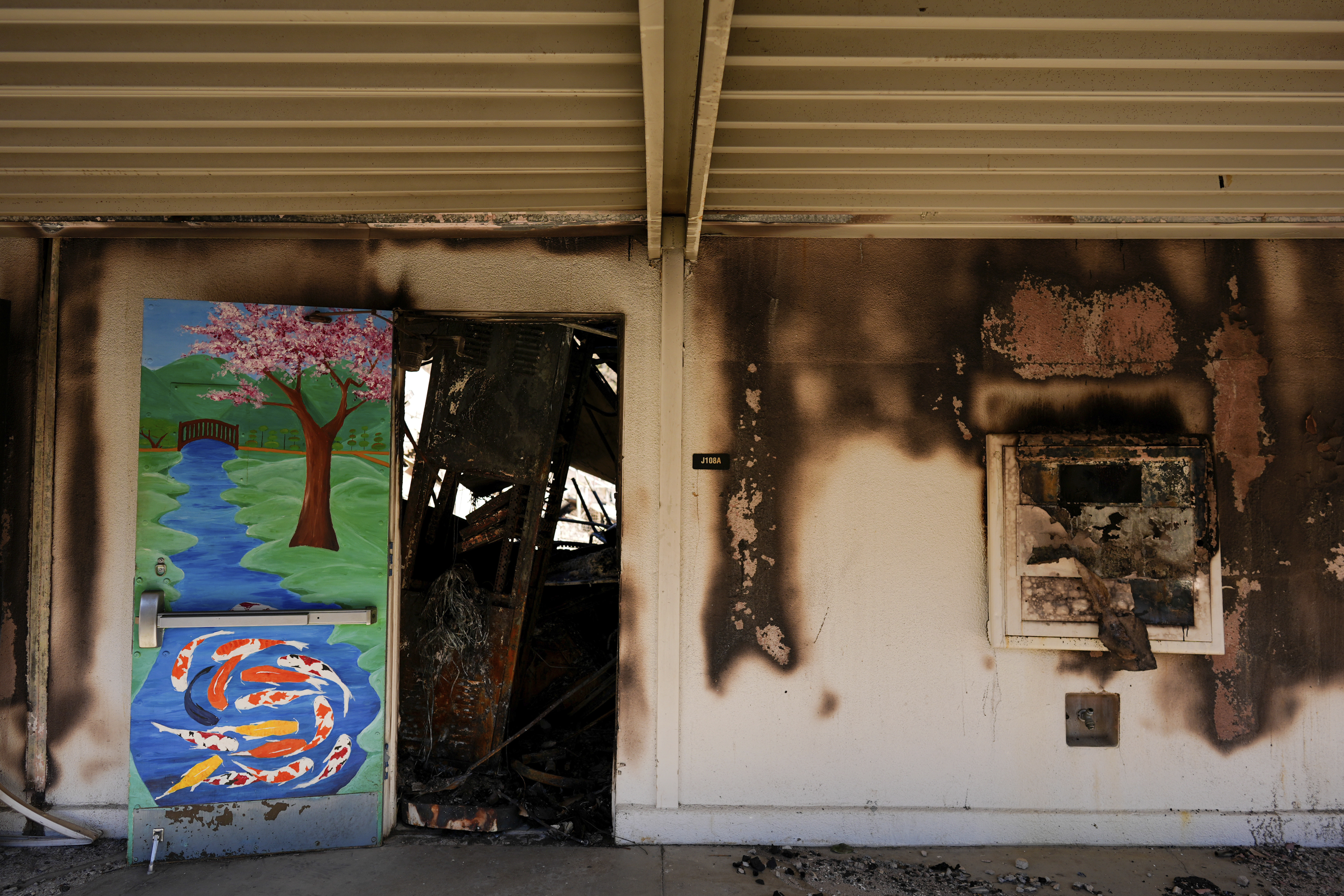 The entrance to a classroom is seen at Palisades High School in the aftermath of the Palisades Fire in the Pacific Palisades neighborhood of Los Angeles, Tuesday, Jan. 14, 2025. (AP Photo/Carolyn Kaster)