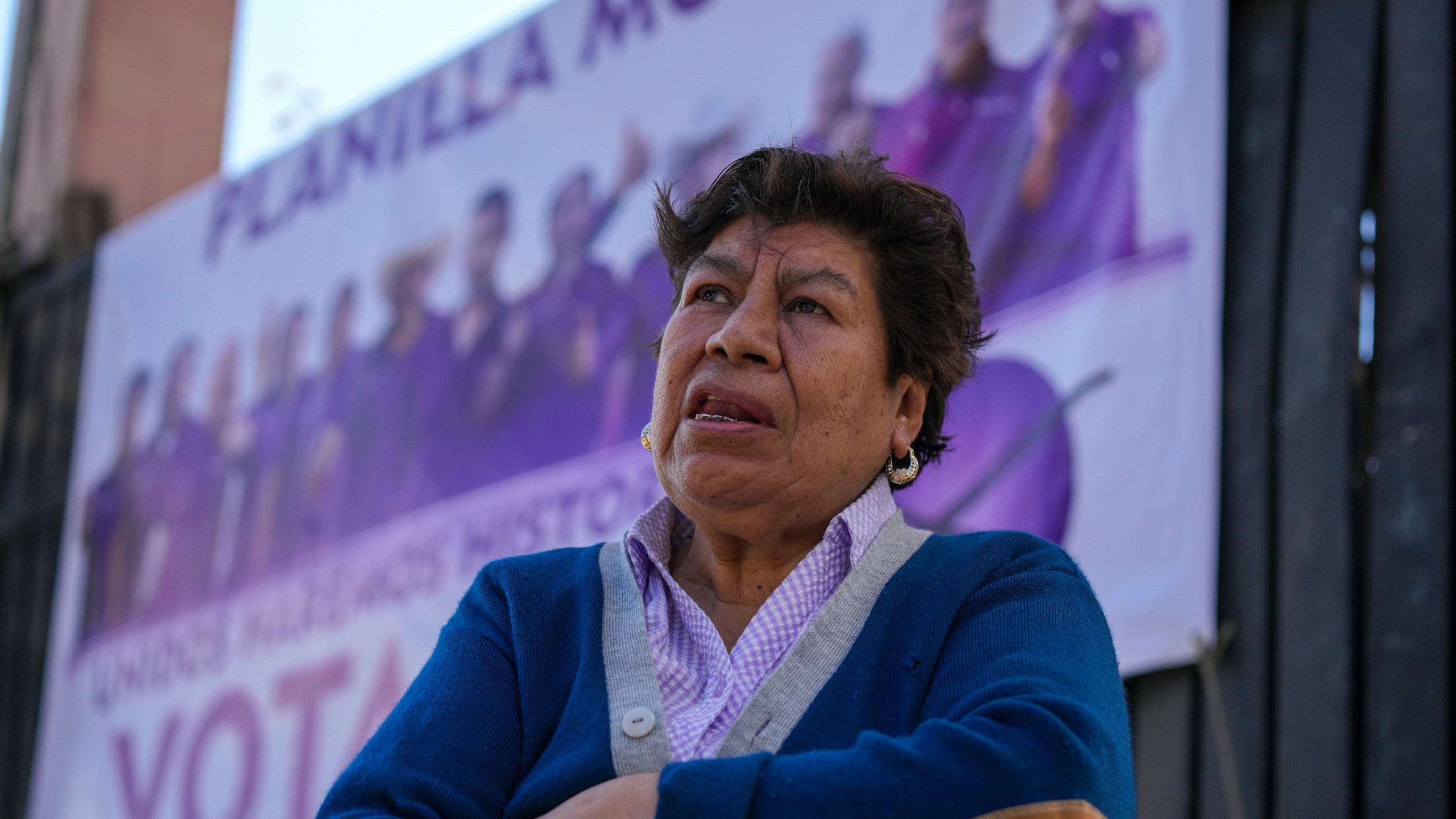 Blanca Delgadillo, a relative of one of five people who were killed the night before, speaks during an interview outside her home in Huitzilac, Mexico, Tuesday, Jan. 14, 2025. (AP Photo/Fernando Llano)