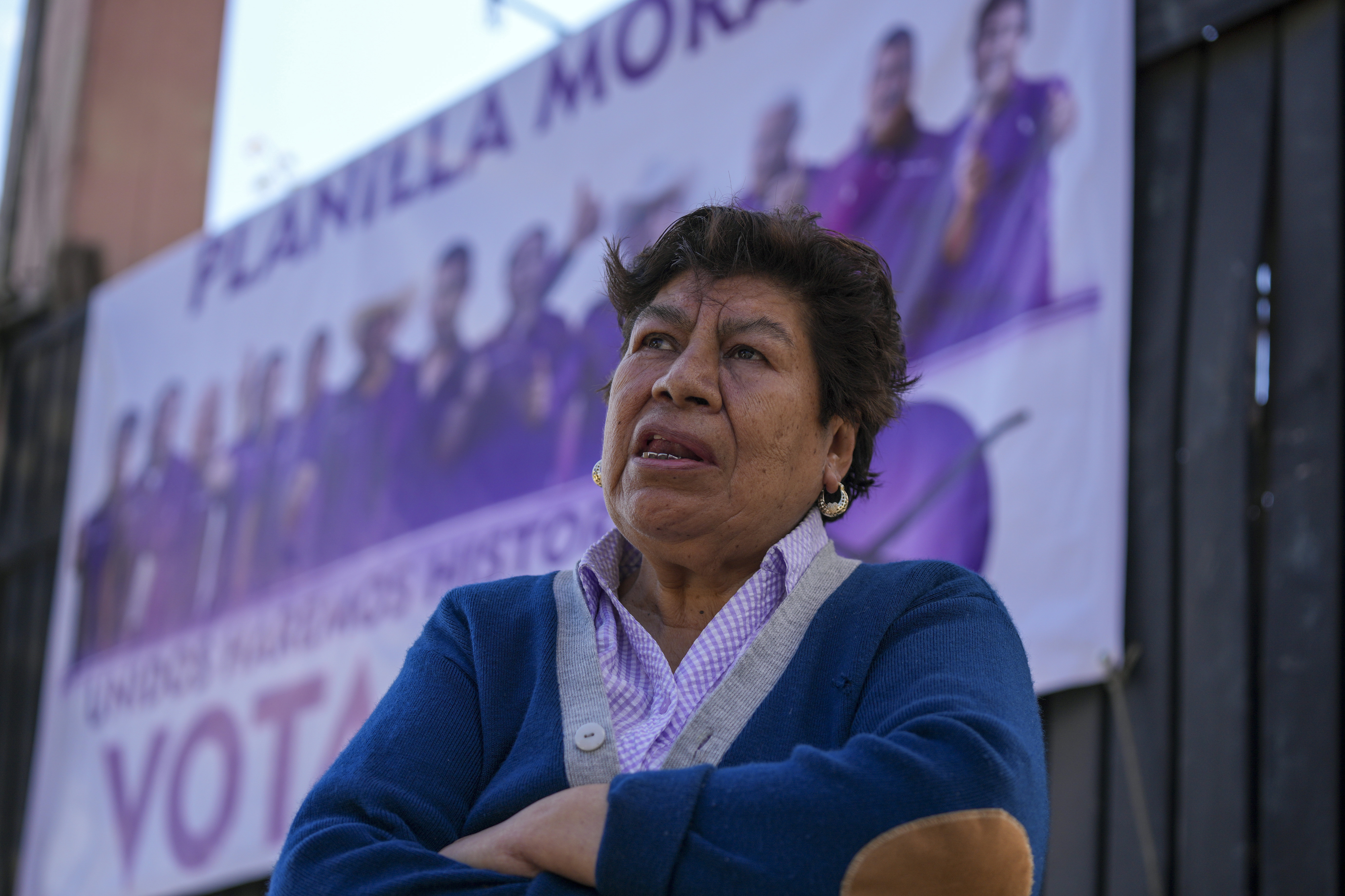 Blanca Delgadillo, a relative of one of five people who were killed the night before, speaks during an interview outside her home in Huitzilac, Mexico, Tuesday, Jan. 14, 2025. (AP Photo/Fernando Llano)