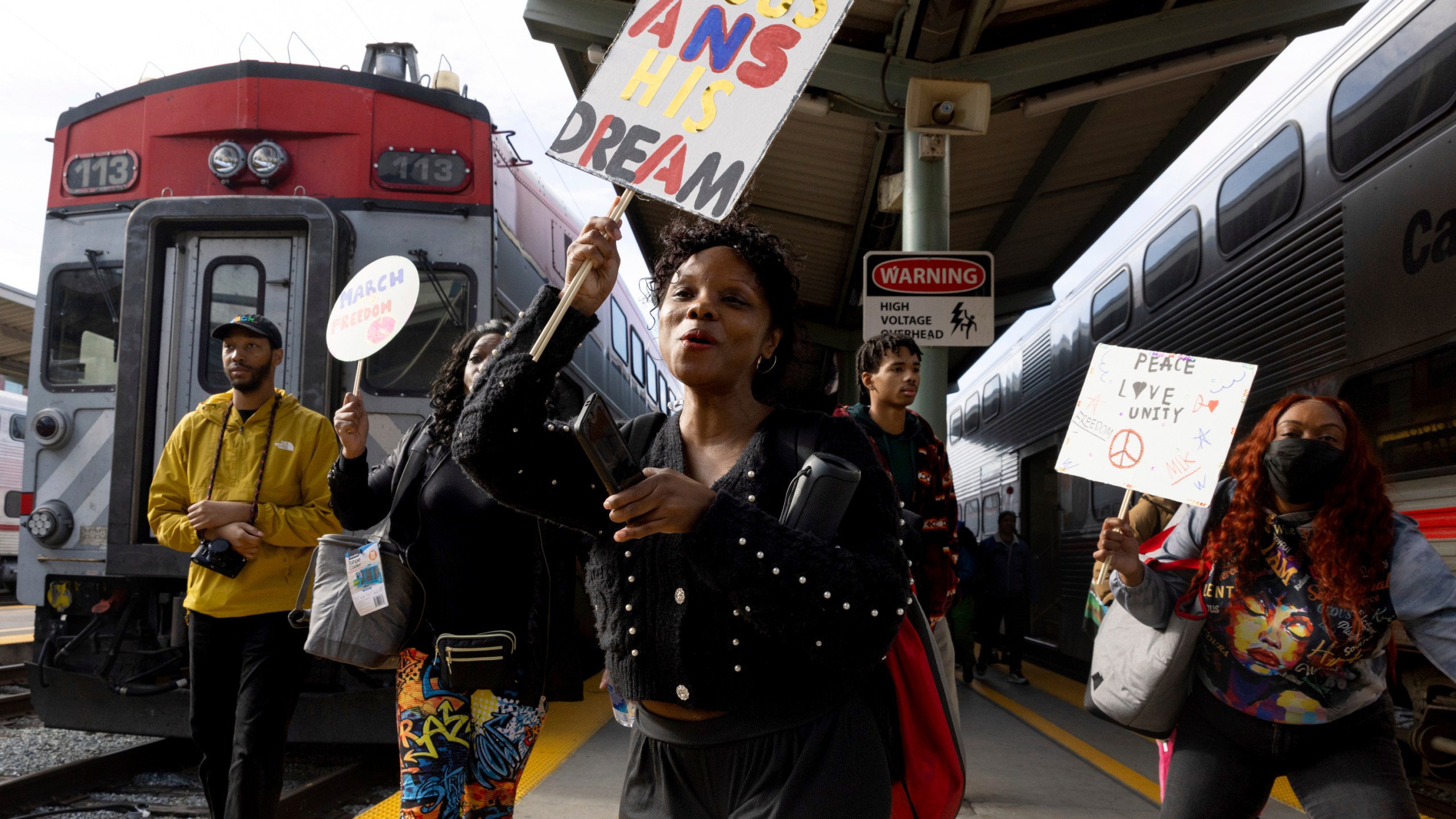 FILE - Passengers depart the Caltrain Norcal MLK Celebration Train in San Francisco on Martin Luther King Jr. Day on Monday, Jan. 15, 2024. (Benjamin Fanjoy/San Francisco Chronicle via AP, File)