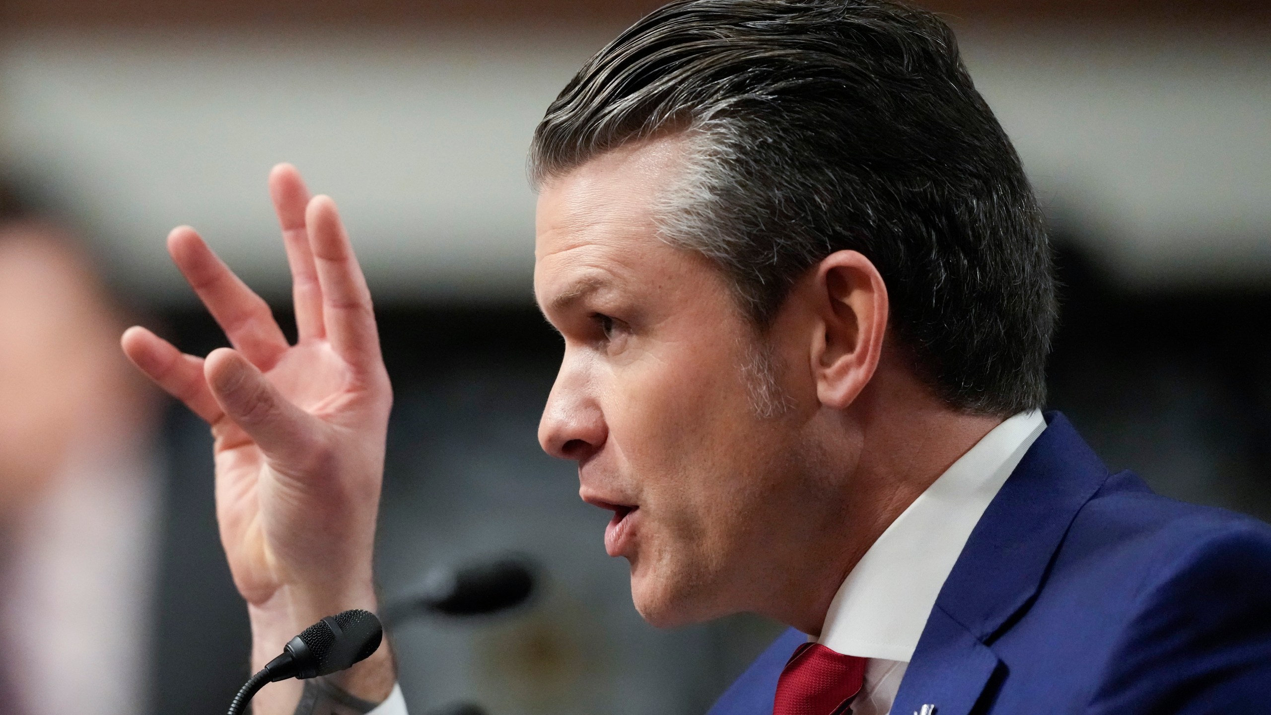 Pete Hegseth, President-elect Donald Trump's choice to be Defense secretary, speaks before the Senate Armed Services Committee for his confirmation hearing, at the Capitol in Washington, Tuesday, Jan. 14, 2025. (AP Photo/Ben Curtis)