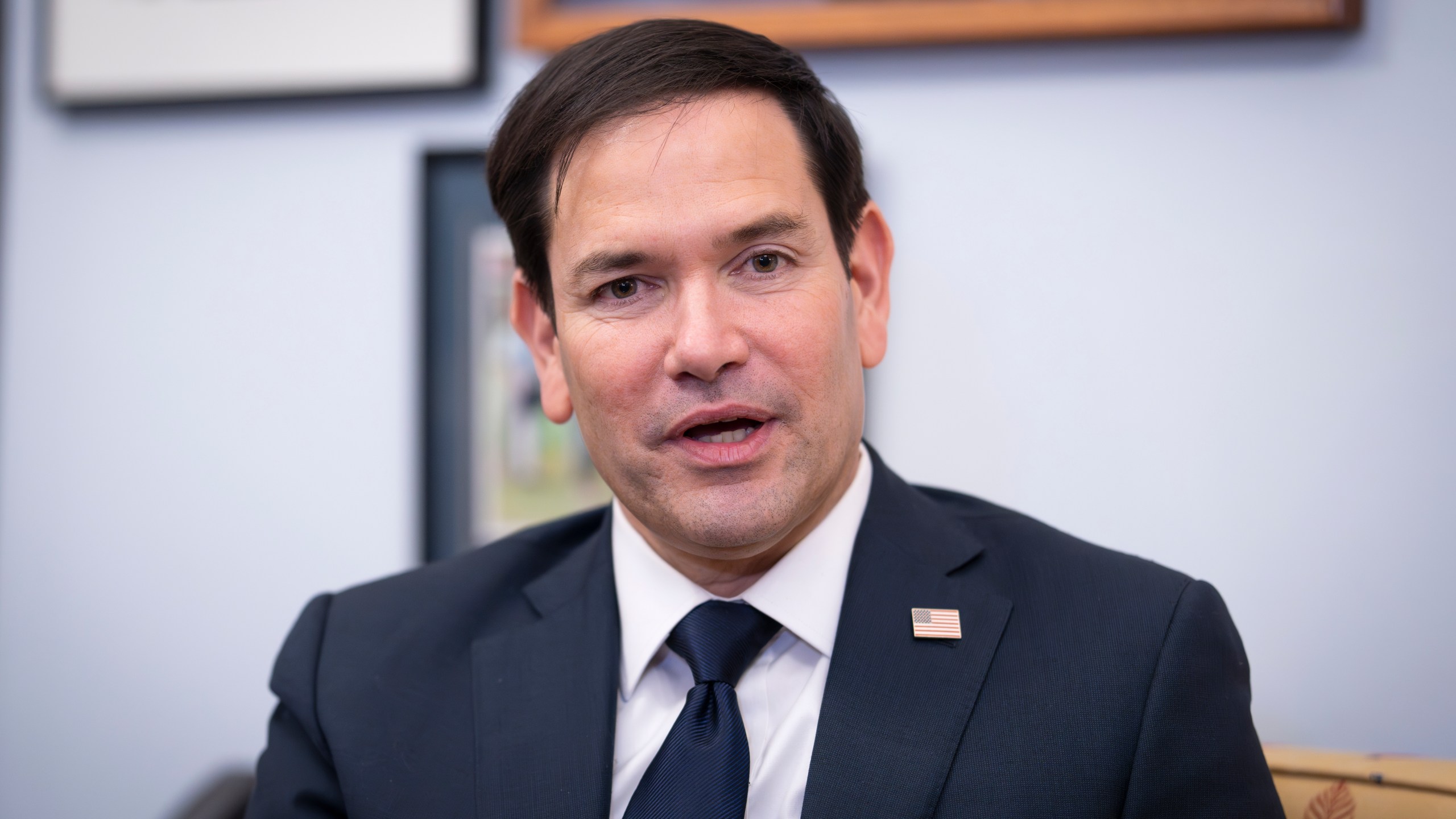 FILE - Sen. Marco Rubio, R-Fla., President-elect Trump's nominee to be secretary of State, speaks as he meets with Sen. Lindsey Graham, R-S.C., at the Capitol in Washington, Dec. 3, 2024. (AP Photo/J. Scott Applewhite, File)