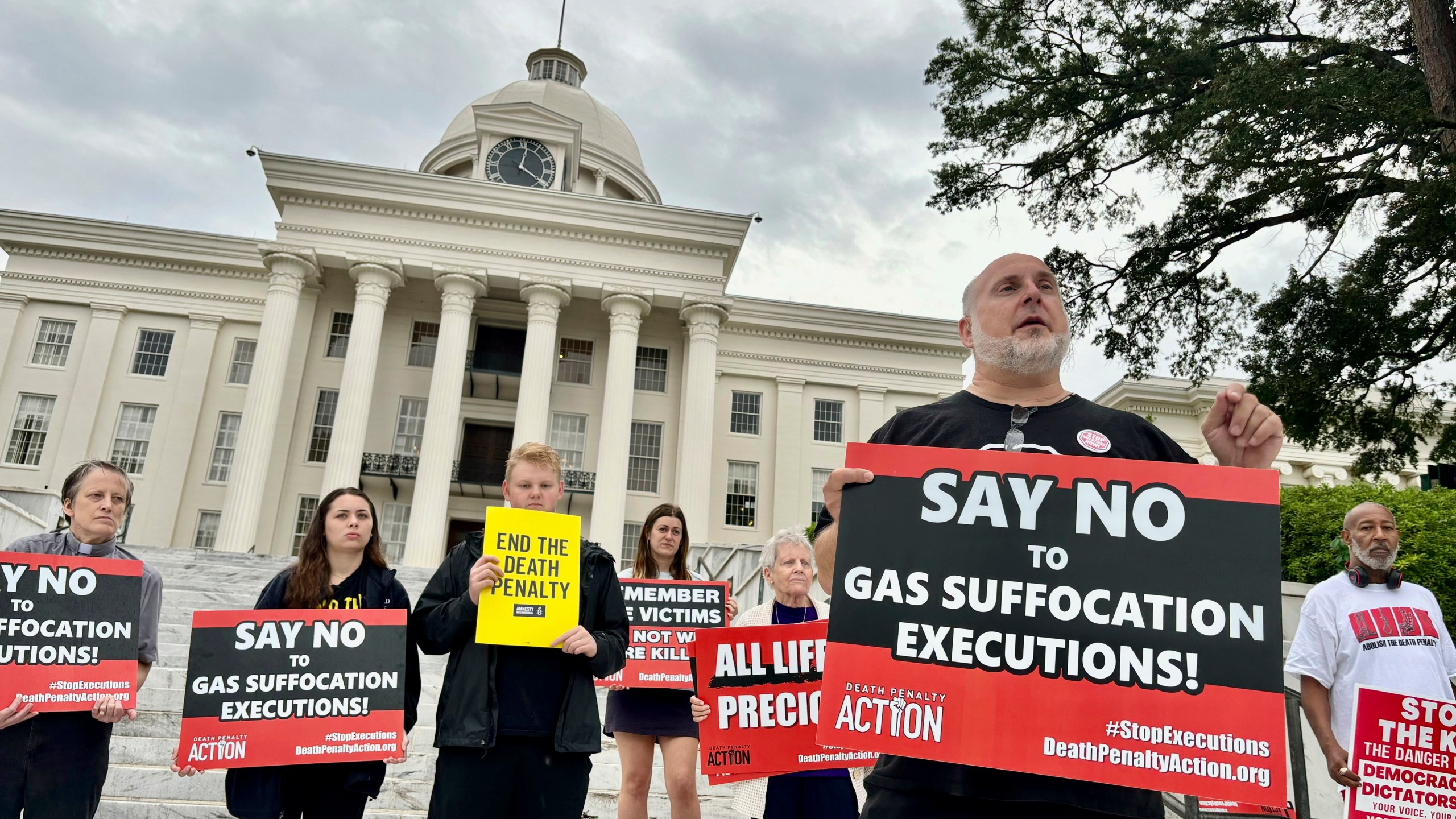 FILE - Abraham Bonowitz, executive director of Death Penalty Action, and other death penalty opponents hold a demonstration outside the Alabama Capitol in Montgomery, Ala., Sept. 25, 2024, asking the state to call off the scheduled execution of Alan Miller in what would be the nation's second execution using nitrogen gas. (AP Photo/Kim Chandler, File)