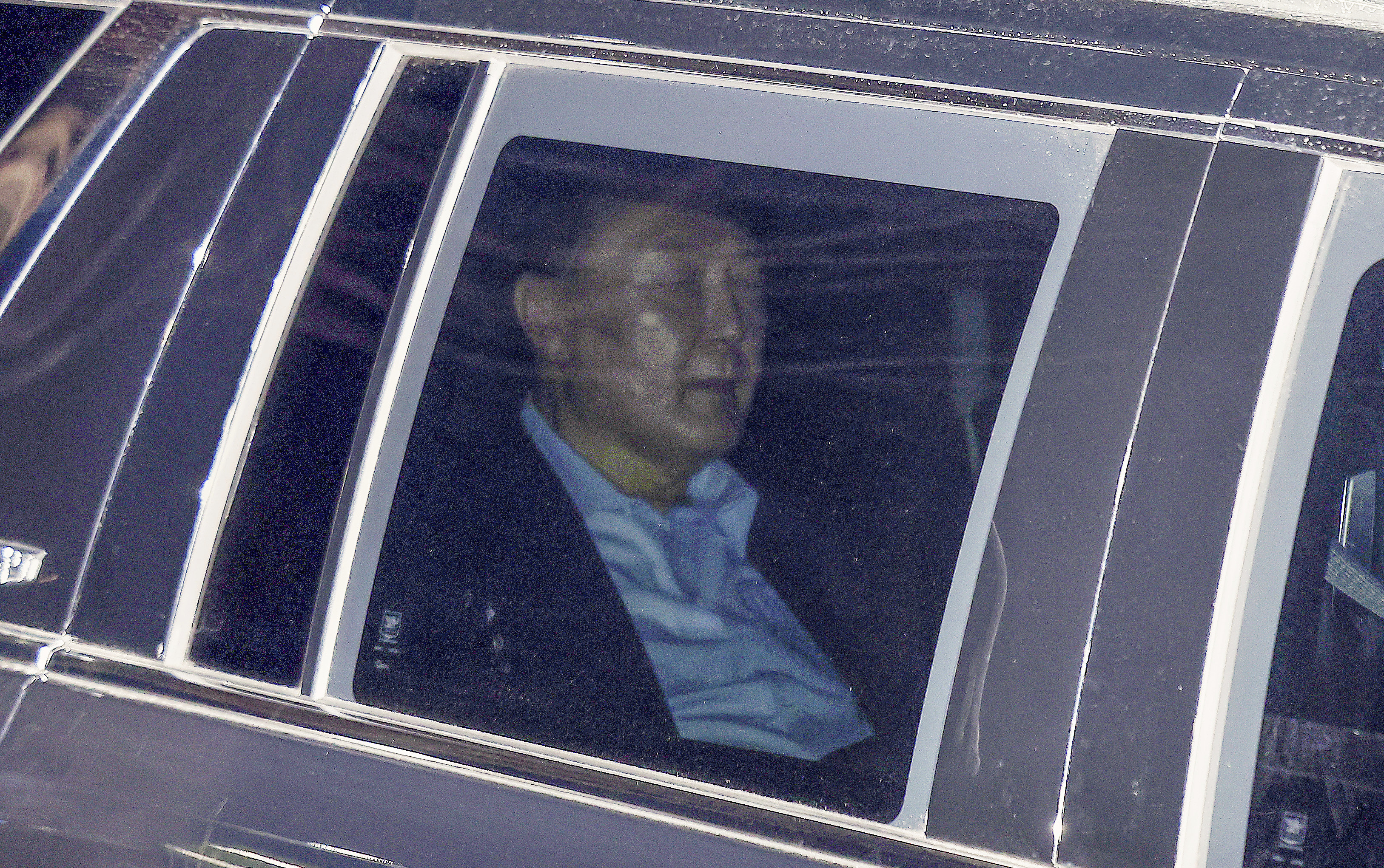 Impeached South Korean President Yoon Suk Yeol, sits in a car as he heads to a detention center in Uiwang, South Korea, Wednesday, Jan. 15, 2025. (Kim Sung-min/Yonhap via AP)