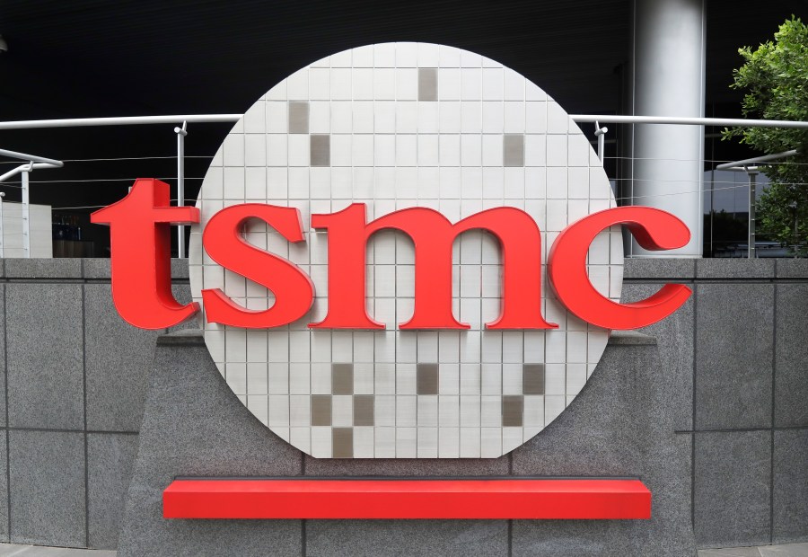 FILE - Taiwan Semiconductor Manufacturing Co., Ltd. (TSMC) logo brands the headquarters in Hsinchu, Taiwan, Wednesday, Oct. 20, 2021. (AP Photo/Chiang Ying-ying, File)