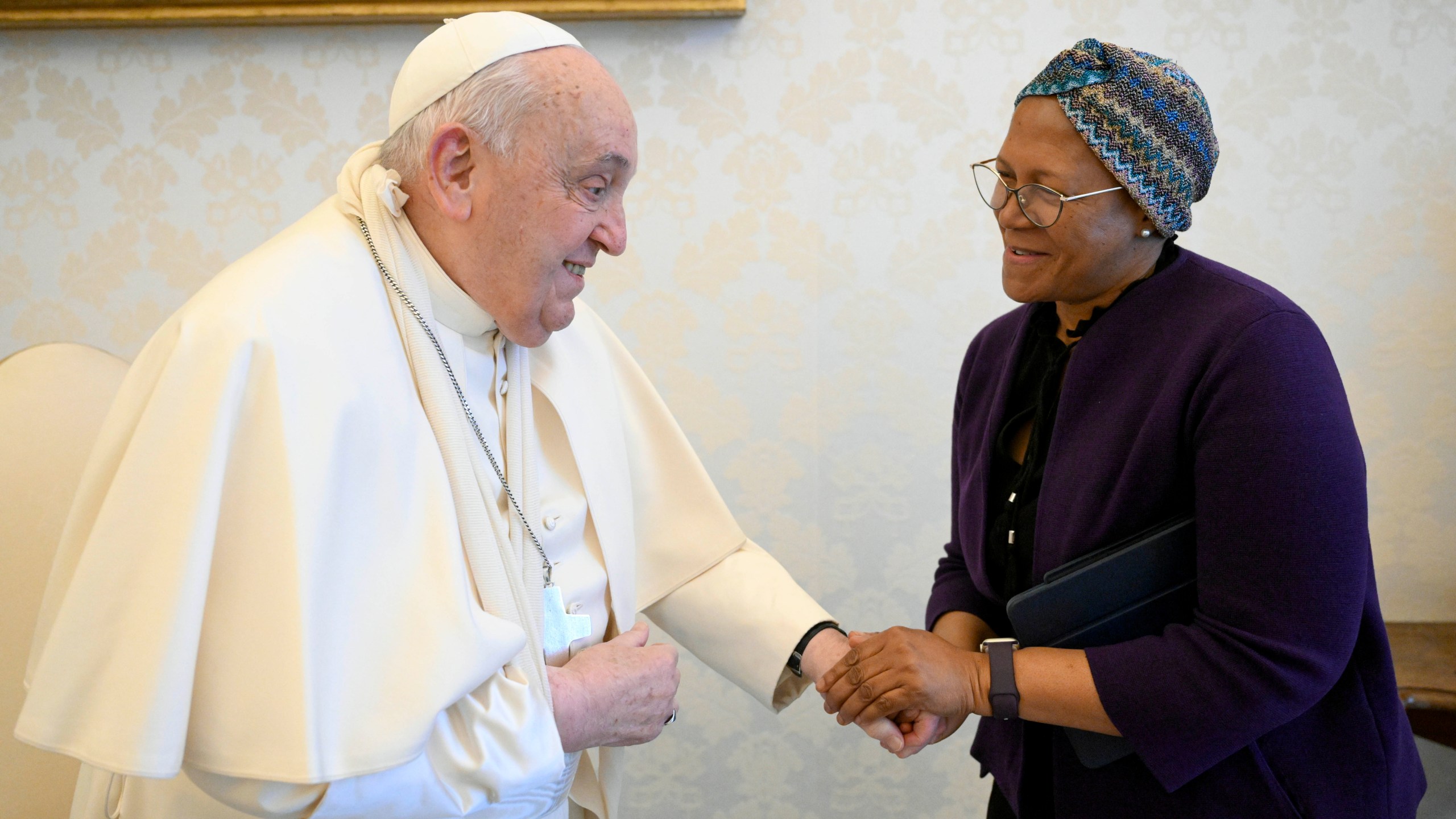 In this picture made available on Thursday, Jan. 16, 2025 by Vatican Media, Pope Francis wears a sling on his right arm, due to a fall earlier in the day, while meeting with FAO Programme Committee Chairperson on World Food Security Nosipho Nausca-Jean Jezile at The Vatican. (Vatican Media via AP, HOGP)