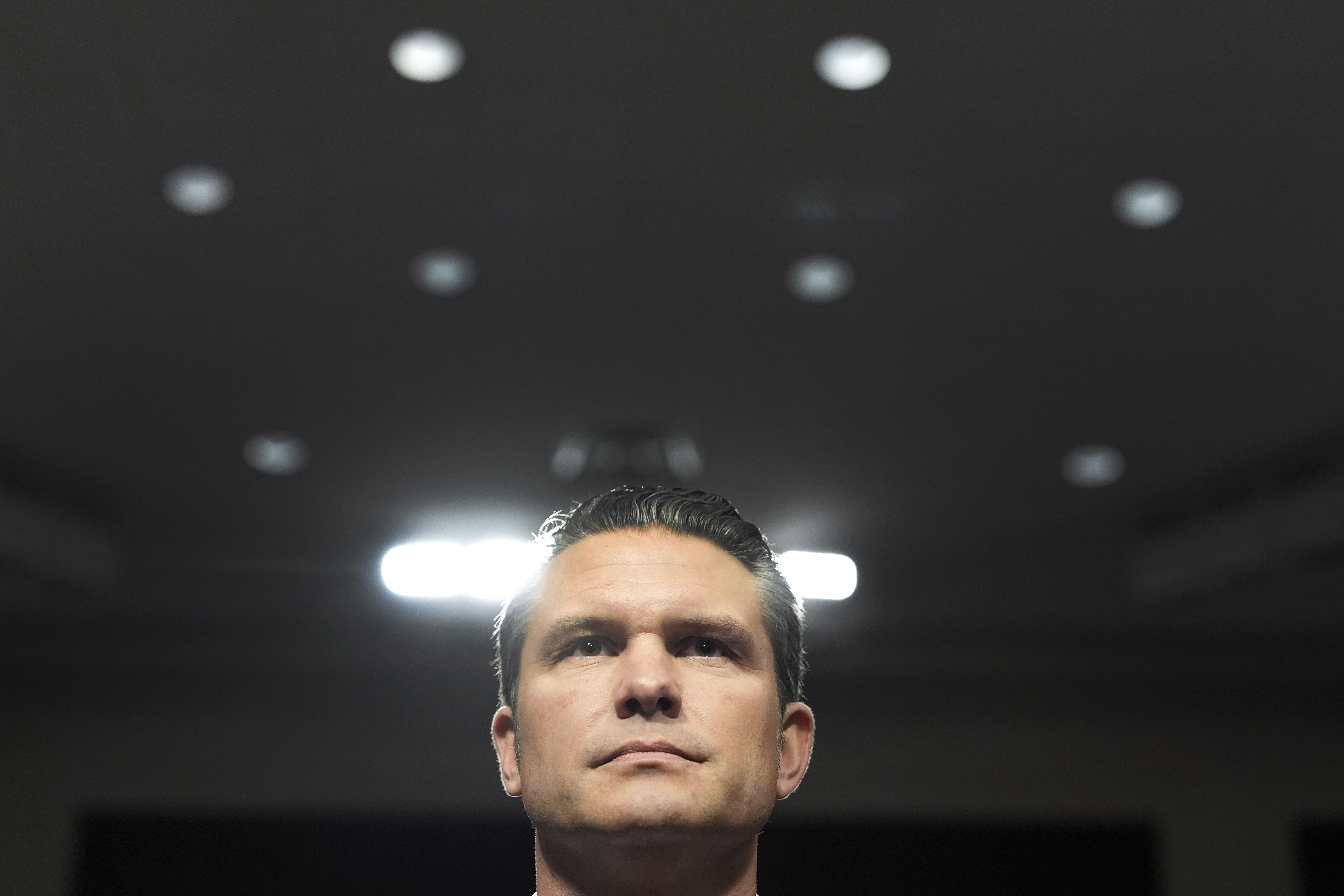 Pete Hegseth, President-elect Donald Trump's choice for defense secretary, appears before the Senate Armed Services Committee for his confirmation hearing, at the Capitol in Washington, Tuesday, Jan. 14, 2025. (AP Photo/Alex Brandon)