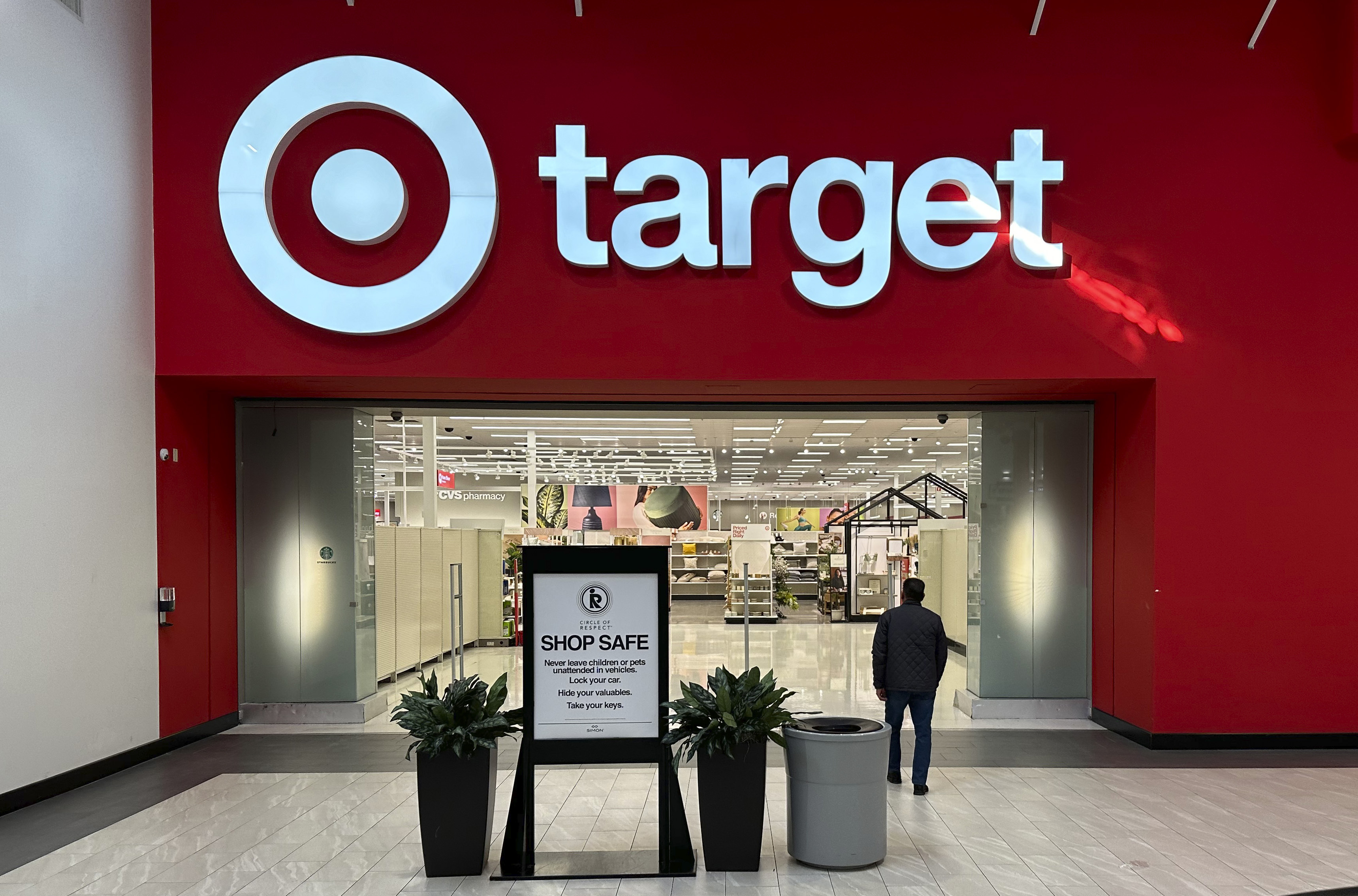 FILE - A person heads into a Target store Thursday, Jan. 11, 2024, in Lakewood, Colo. (AP Photo/David Zalubowski, File)