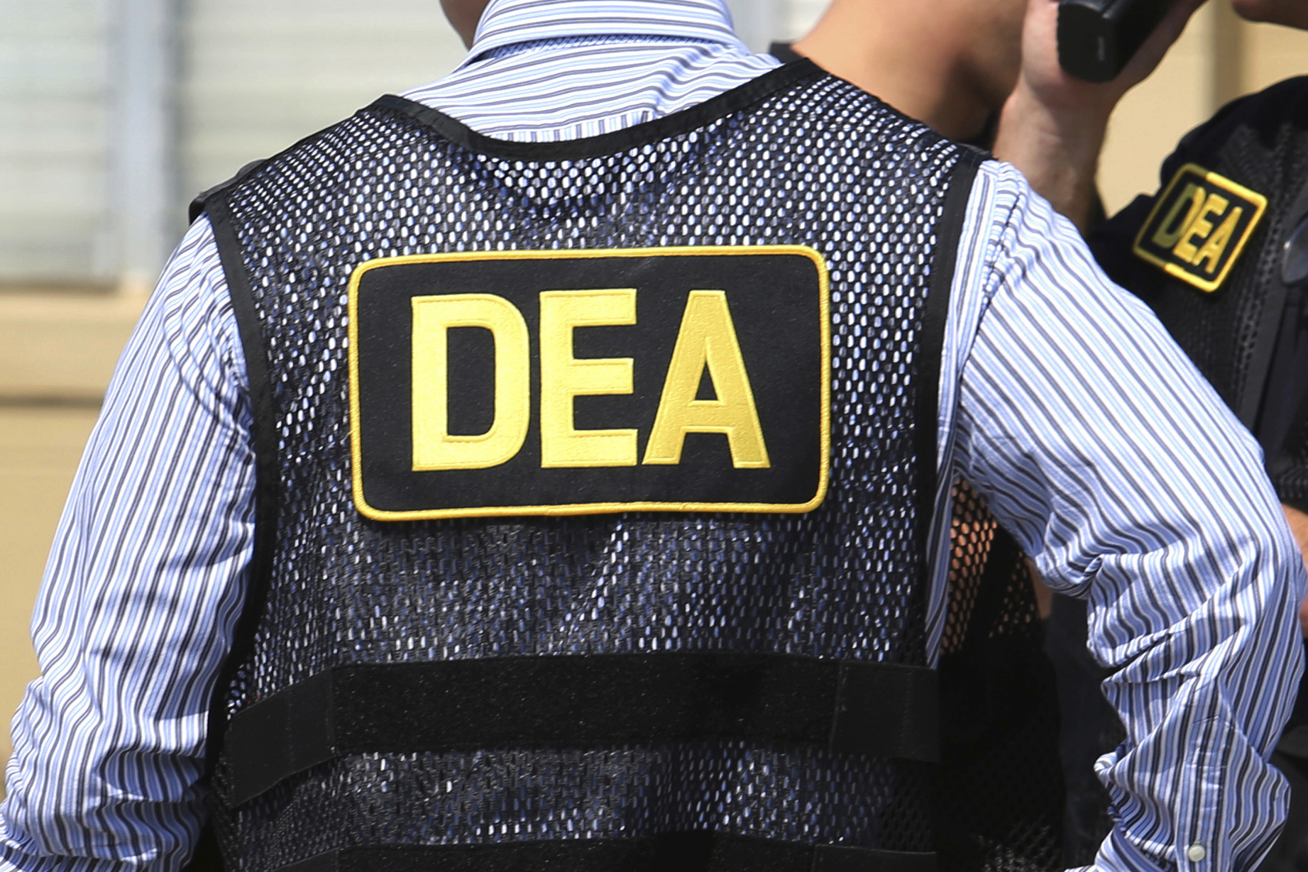 FILE - U.S. Drug Enforcement Administration agents are seen on June 13, 2016, in Florida. (Joe Burbank/Orlando Sentinel via AP, File)