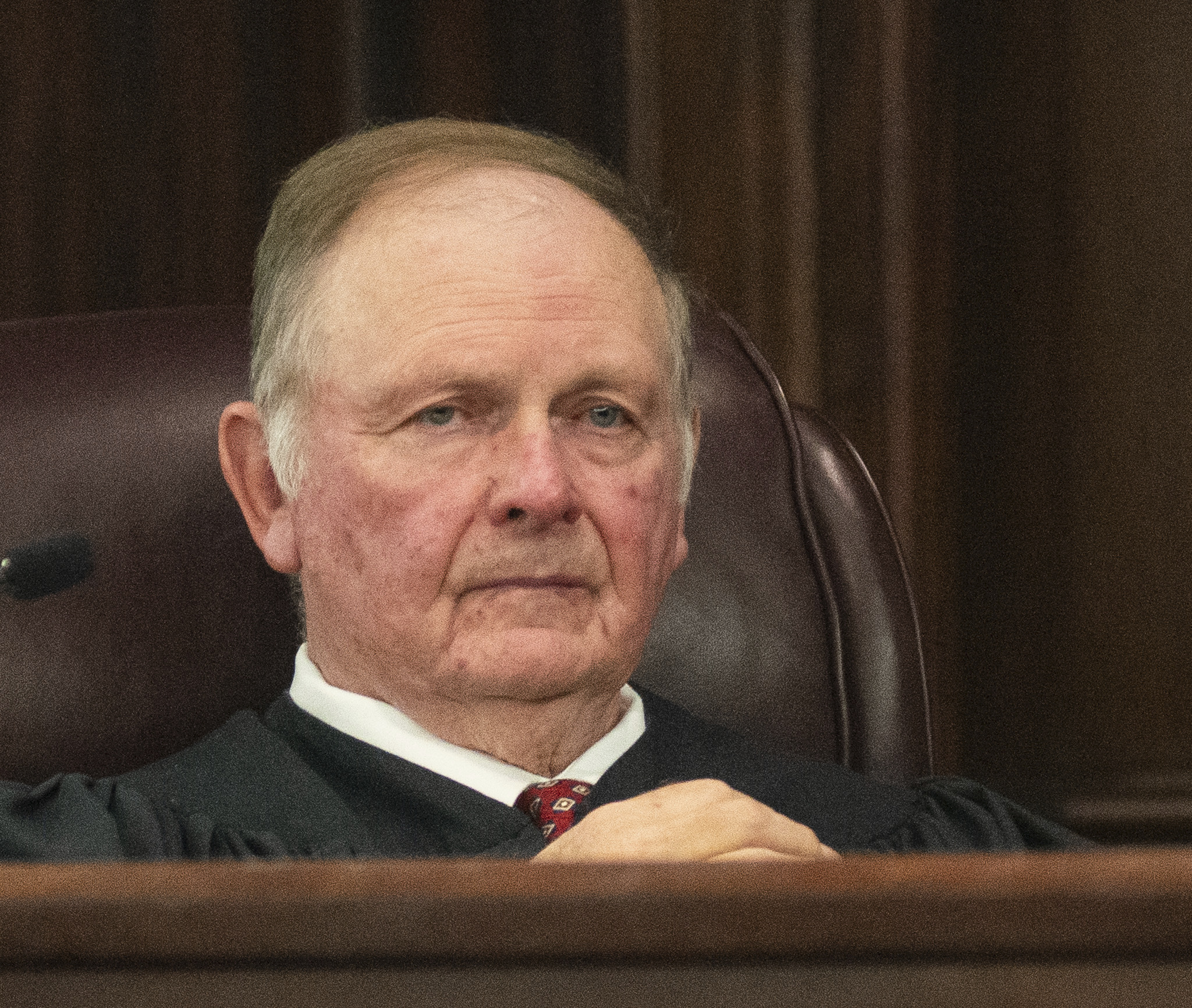 Senior Judge John R. Tuner listens Tuesday, Jan. 28, 2025, in Brunswick, Ga., as prosecutor John Fowler delivers his opening statement in the trial of former Brunswick Judicial Circuit District Attorney Jackie Johnson who is accused of obstruction of justice and violating her oath of office. (Terry Dickson/The Brunswick News via AP, Pool)