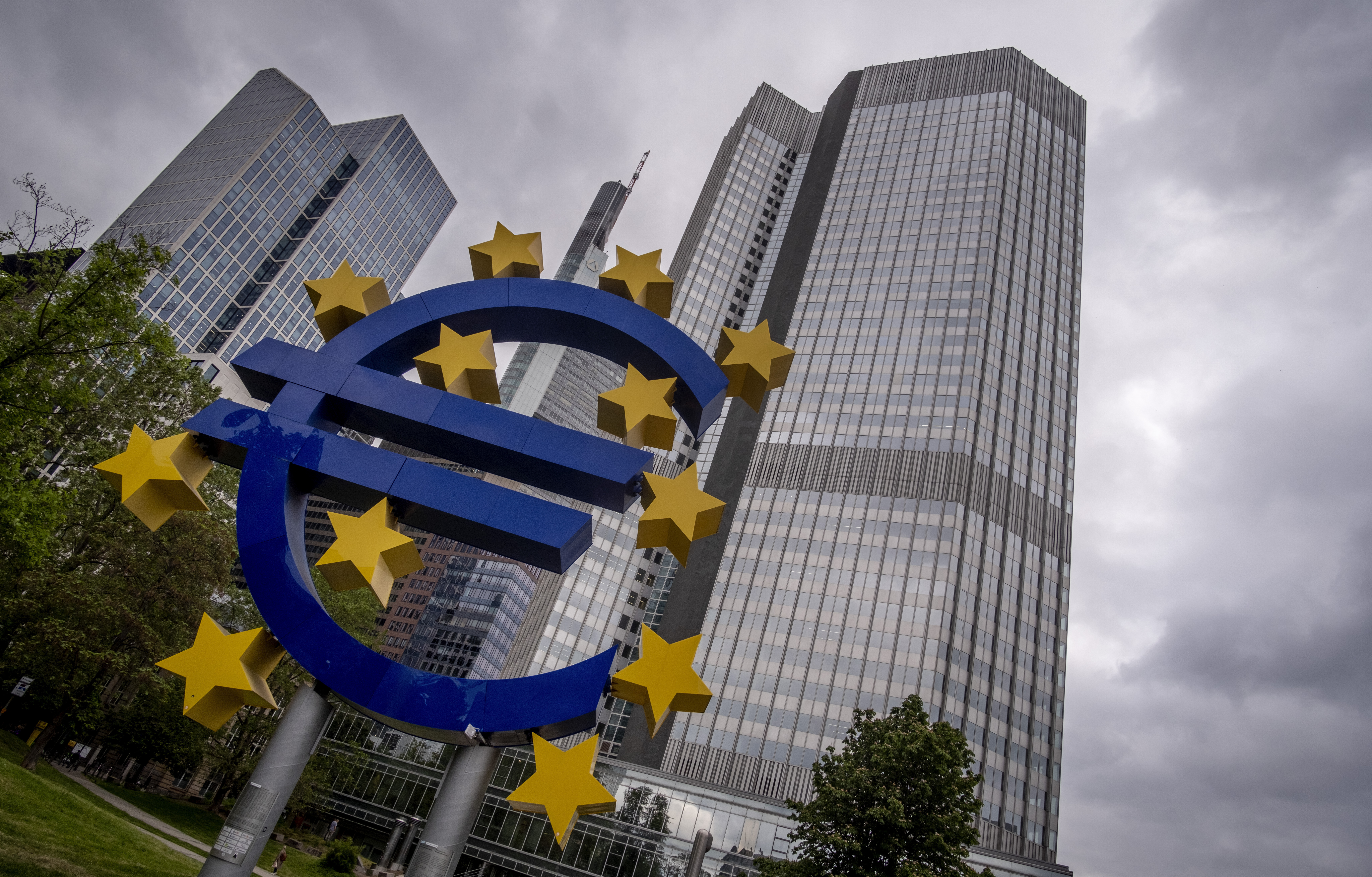 FILE - The Euro sculpture stands in front of the former headquarters of the European Central Bank (ECB) in Frankfurt, Germany, Tuesday, May 23, 2023. (AP Photo/Michael Probst, File)