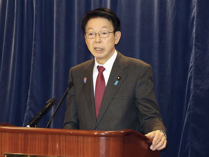 Japanese Trade Minister Yoji Muto speaks during a news conference on the tariffs of Japanese exports including cars and steel, in Washington, Monday, March 10, 2025. (Kyodo News via AP)